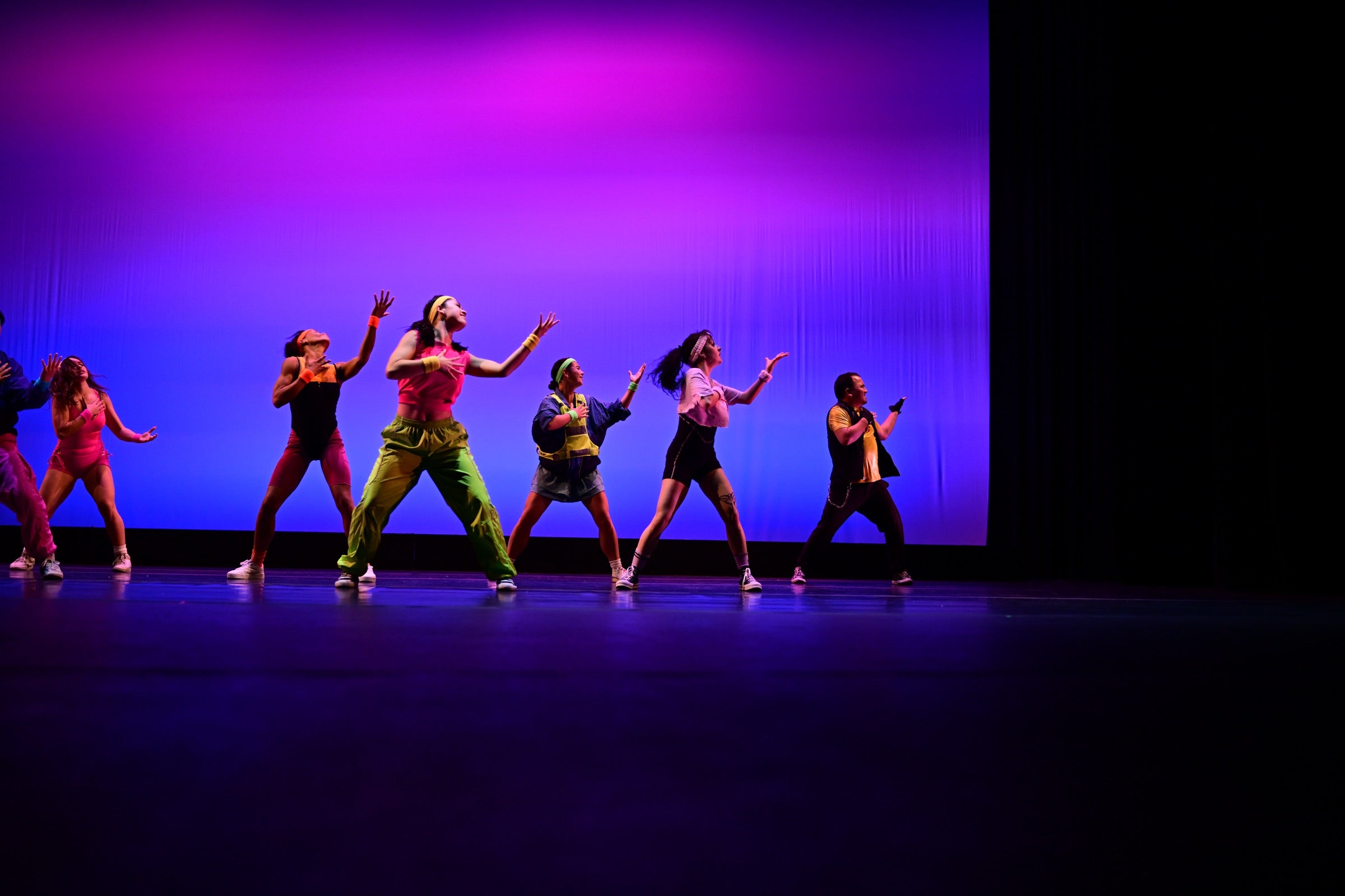 Teen and adult dancers in contemporary class