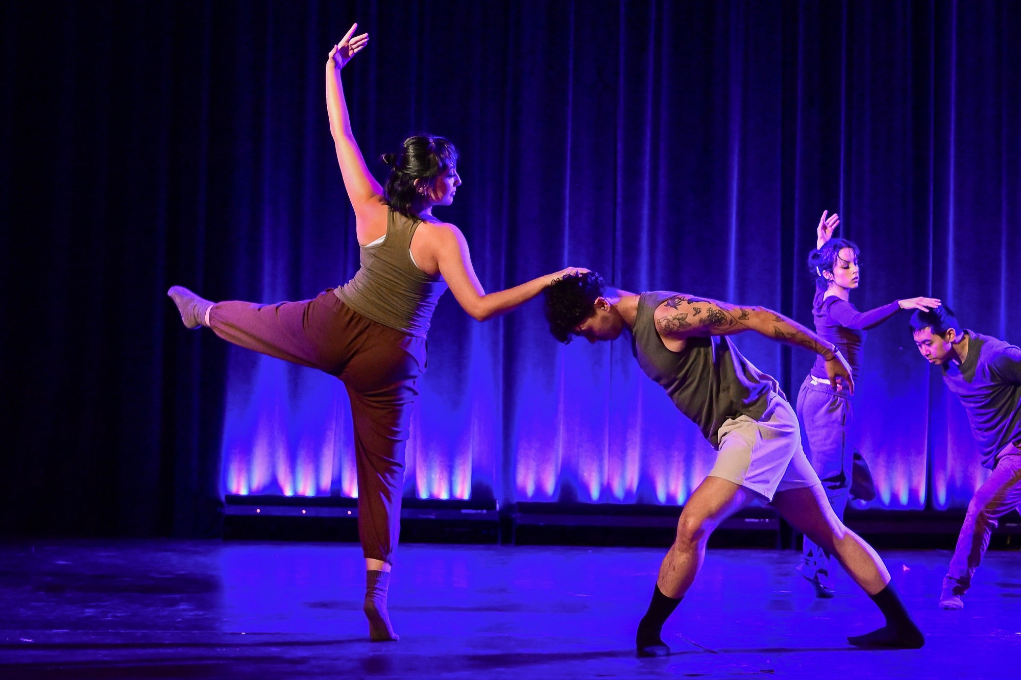 Center Stage dancers performing on stage in formation