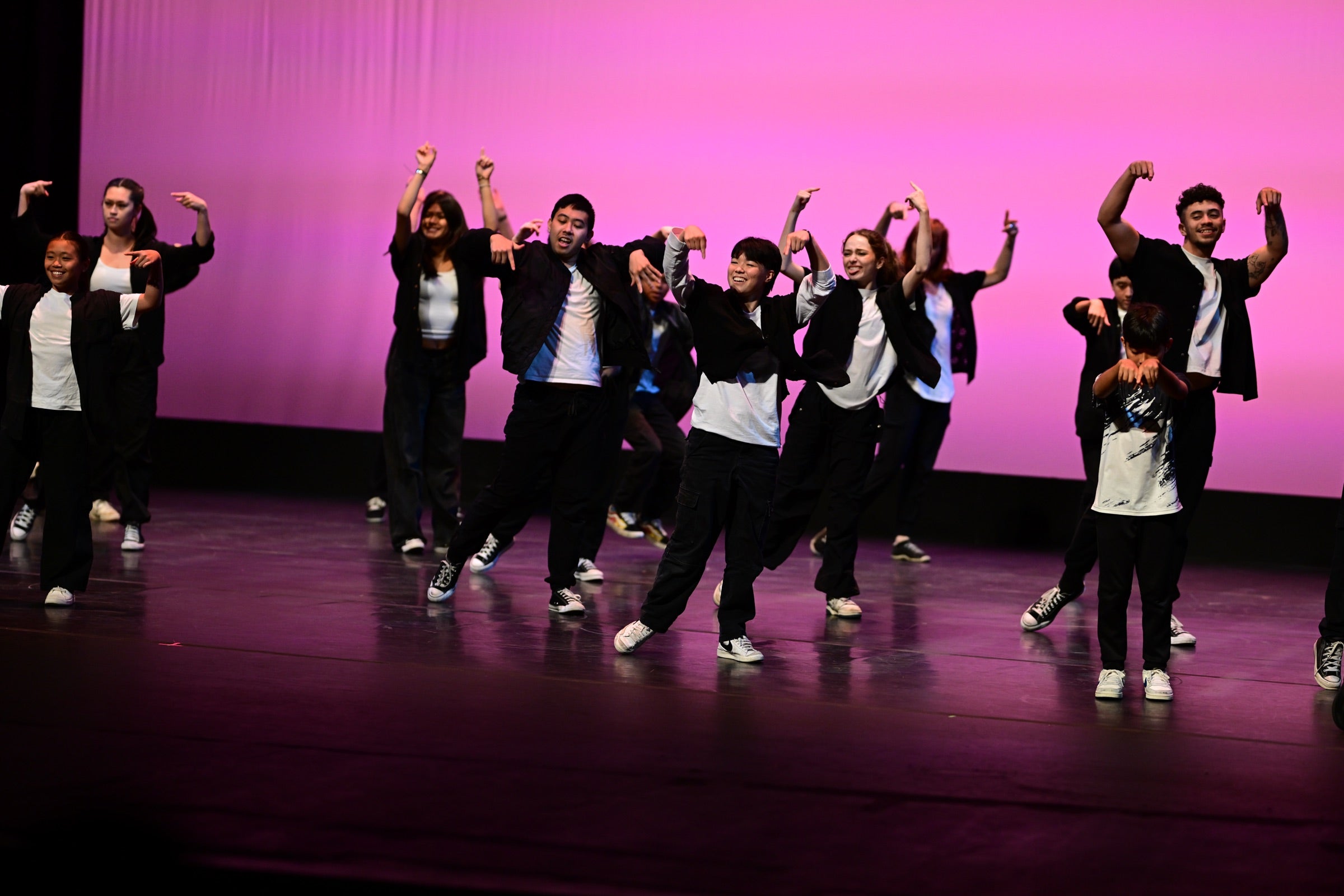 Wide shot of Center Stage dancers performing together on stage